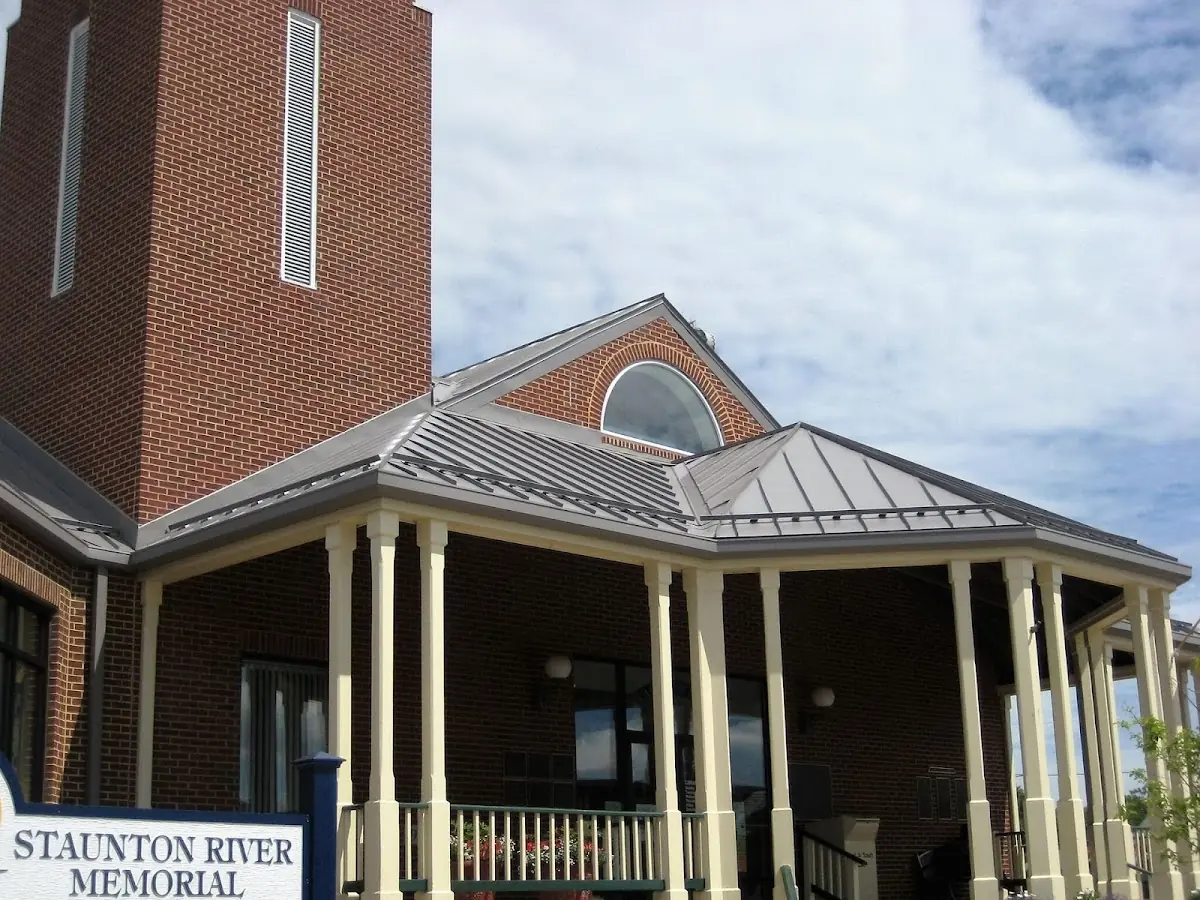 Skilled roofing craftsmen working on a residential roof in Bridgeport